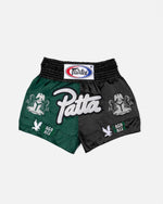 Patta x Fairtex Muay Thai shorts in split green and black satin with embroidered branding.