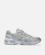 Asics Gel-Kayano 20 in Piedmont Grey featuring silver metallic overlays and a lilac gel-cushioned midsole.