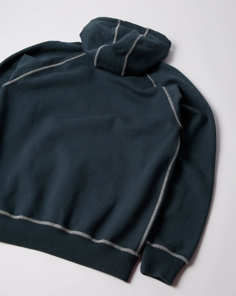 Back of the byParra Circled Script Logo hooded sweatshirt in dark blue with white contrast stitching.