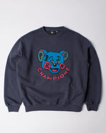 Navy blue byParra Tired Champione crewneck sweatshirt featuring a colorful chest cartoon graphic.