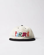 byParra Error Logo 6-Panel Hat in off-white corduroy with a black brim and colorful embroidery.