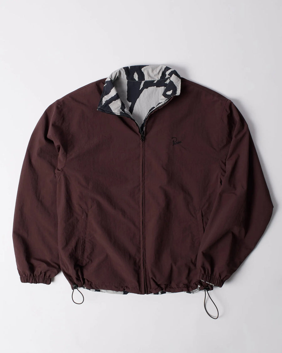 byParra Freak Scene reversible track top in dark brown with a full-zip front and patterned inner collar.