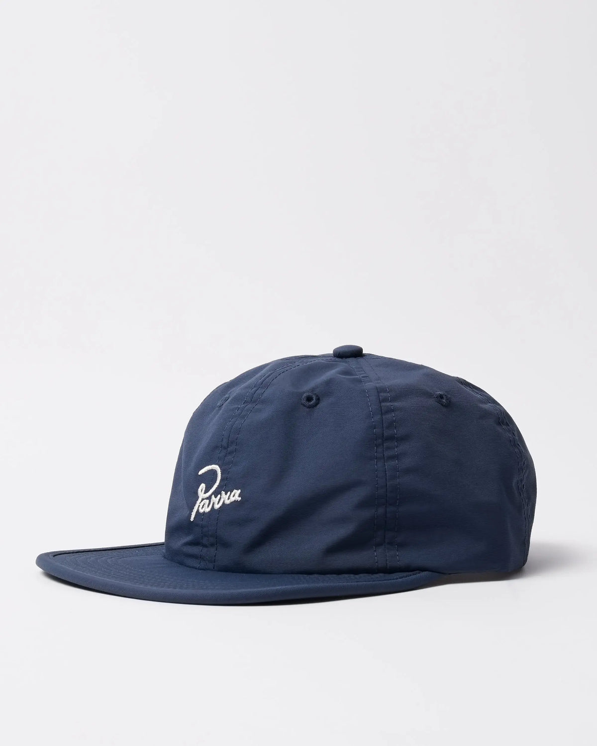 Side profile of the blue byParra Signature 6-panel nylon cap with embroidered white script logo.