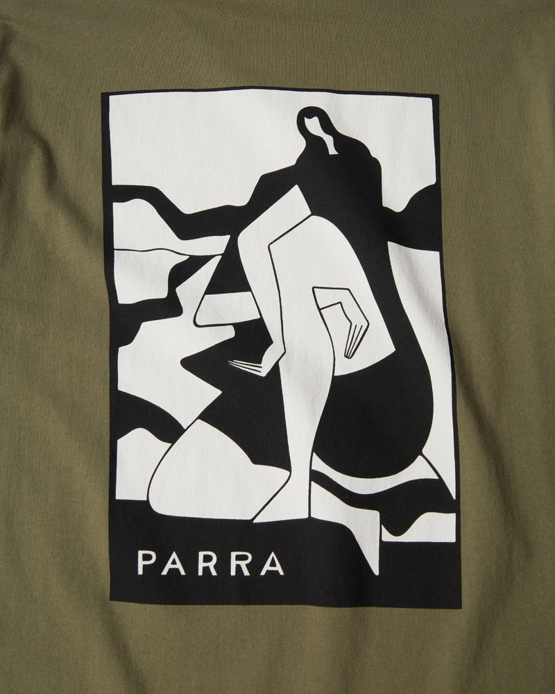 Close-up of black and white abstract graphic print on the green By Parra Waiting for you t-shirt.