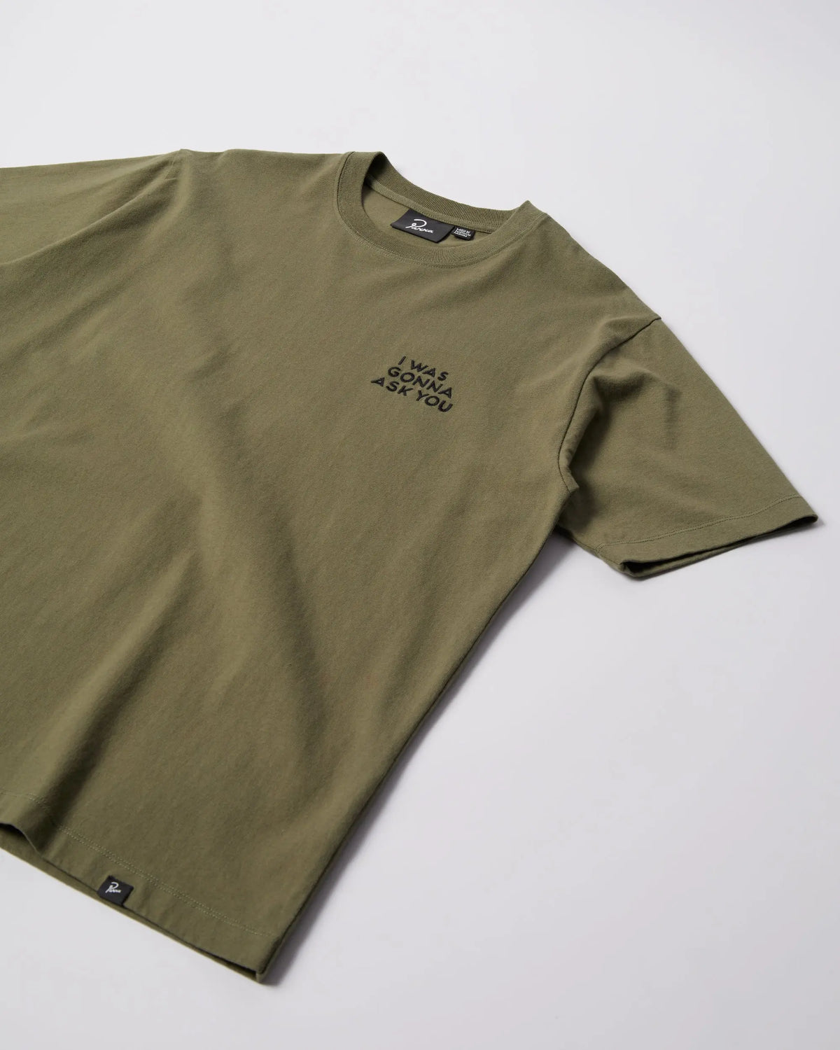 Olive green By Parra Waiting For You cotton t-shirt with embroidered chest text.