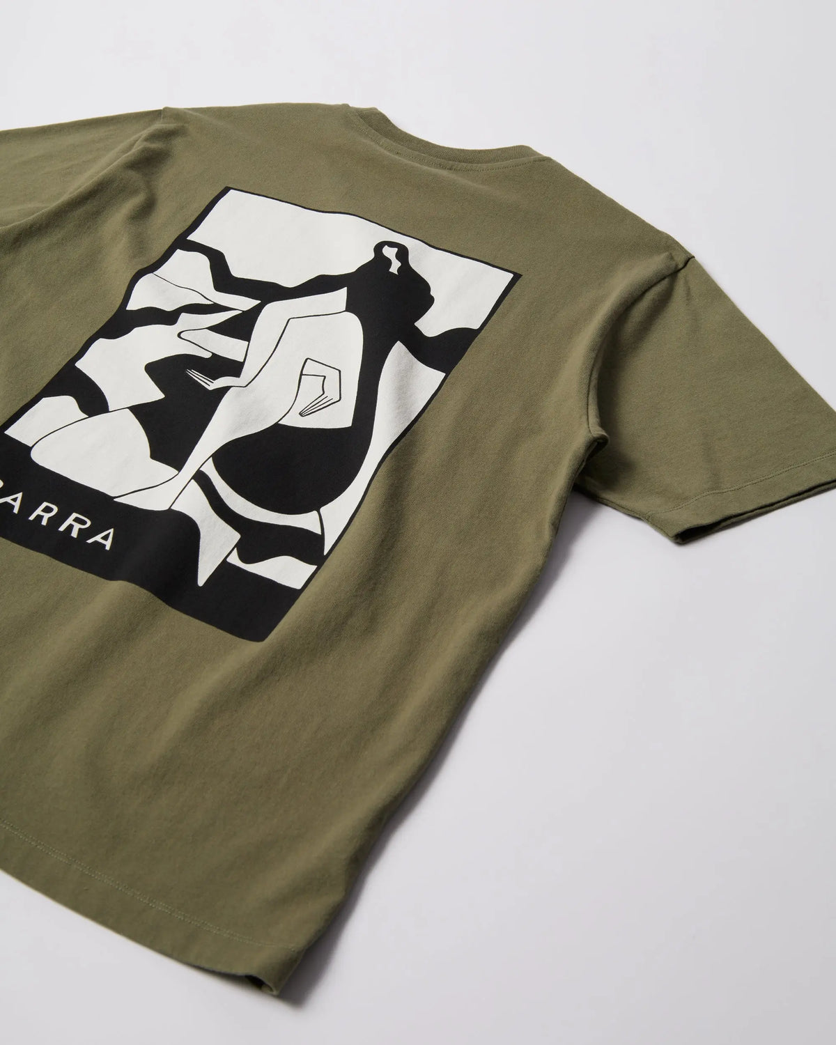 Back view of the green By Parra Waiting for you t-shirt featuring a black and white graphic print.