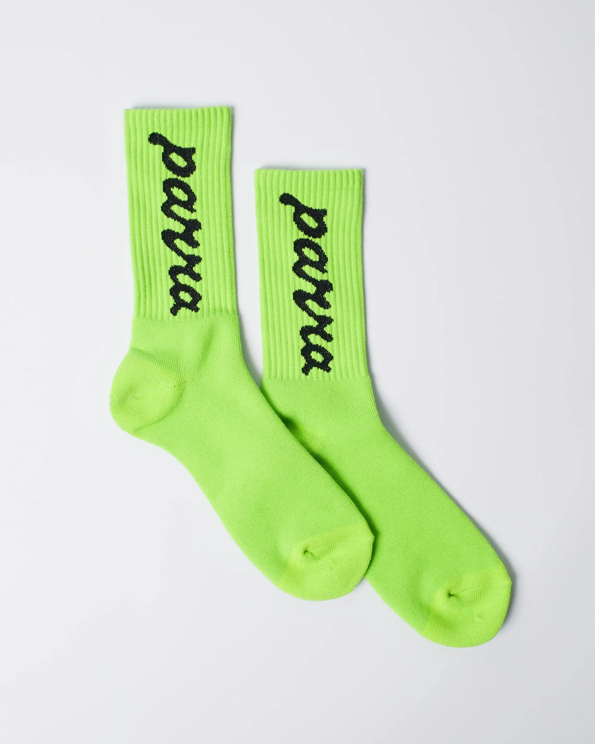 By Parra Lowercase script logo ribbed crew socks in acid green with black lettering.