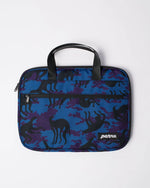 By Parra Purple Camo Beast laptop sleeve in blue with handles and front zip pocket.
