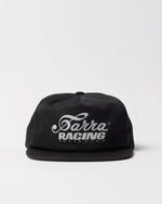 Black By Parra Racing 5-panel hat featuring white embroidered logo branding across the front.
