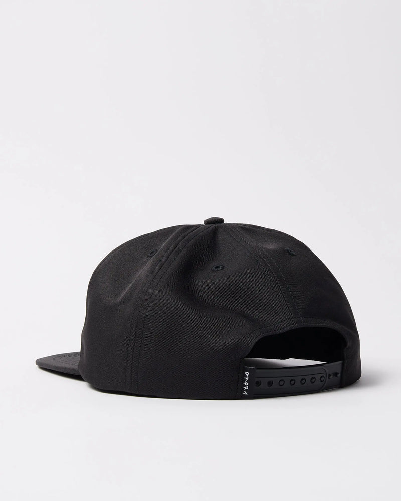 Rear view of the black By Parra Racing 5-panel hat, showing the adjustable snapback strap.