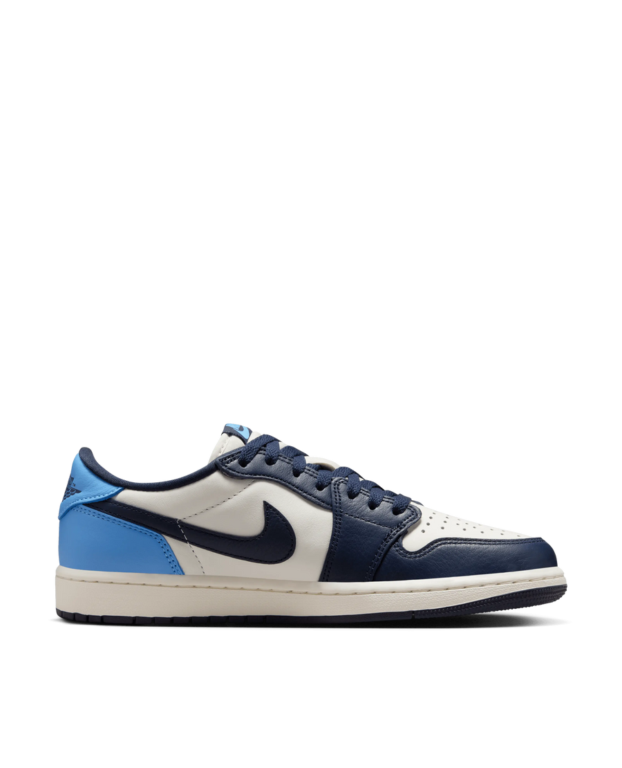 Air Jordan 1 Low OG sneaker in Obsidian, University Blue, and Sail shown in lateral side profile.