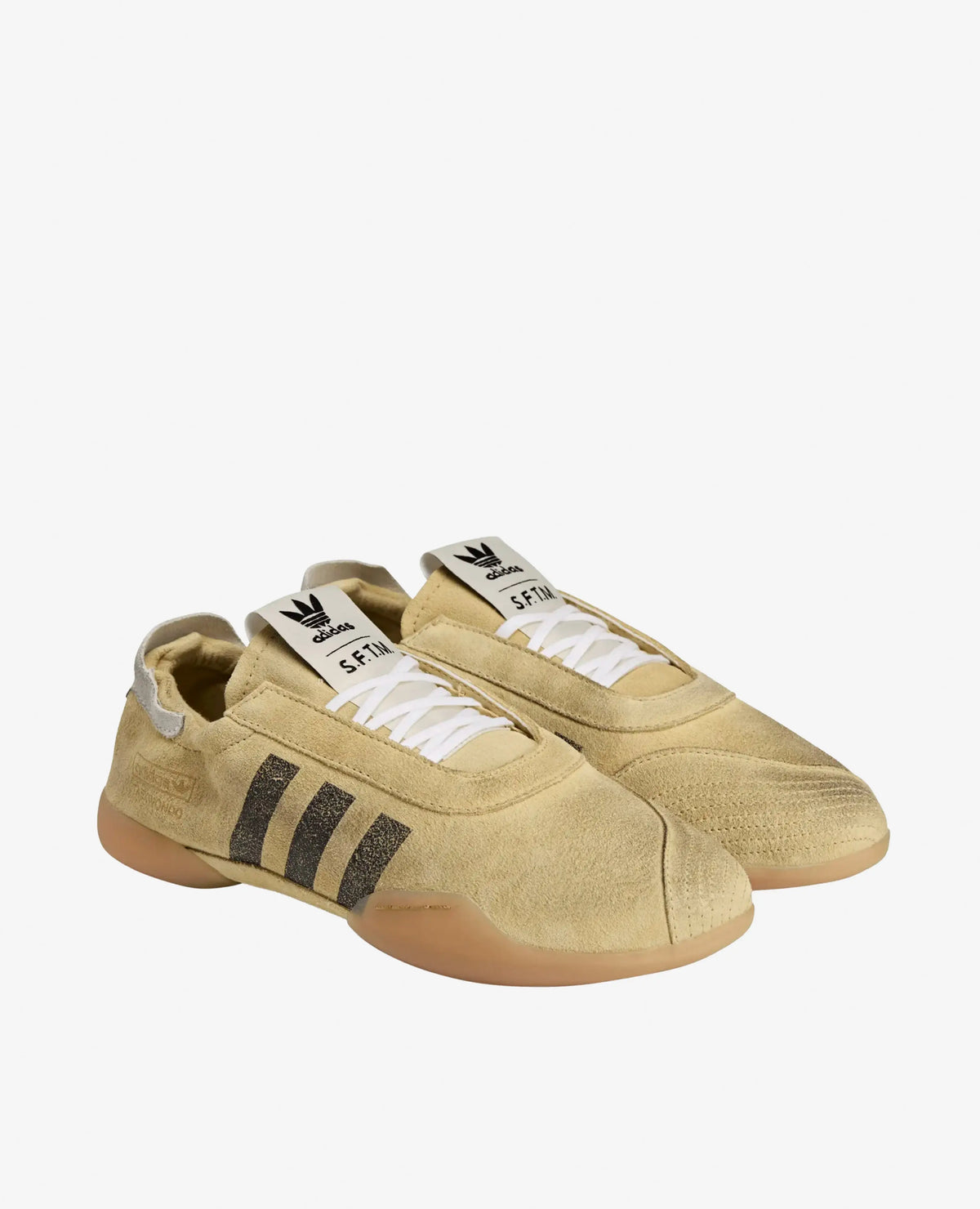 adidas x Song For The Mute Taekwondo Mei sneakers in cream suede with black stripes and gum soles.