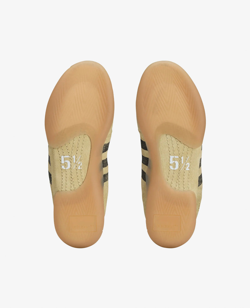 Gum outsoles of adidas Song For The Mute x Taekwondo Mei sneakers in Cream White.