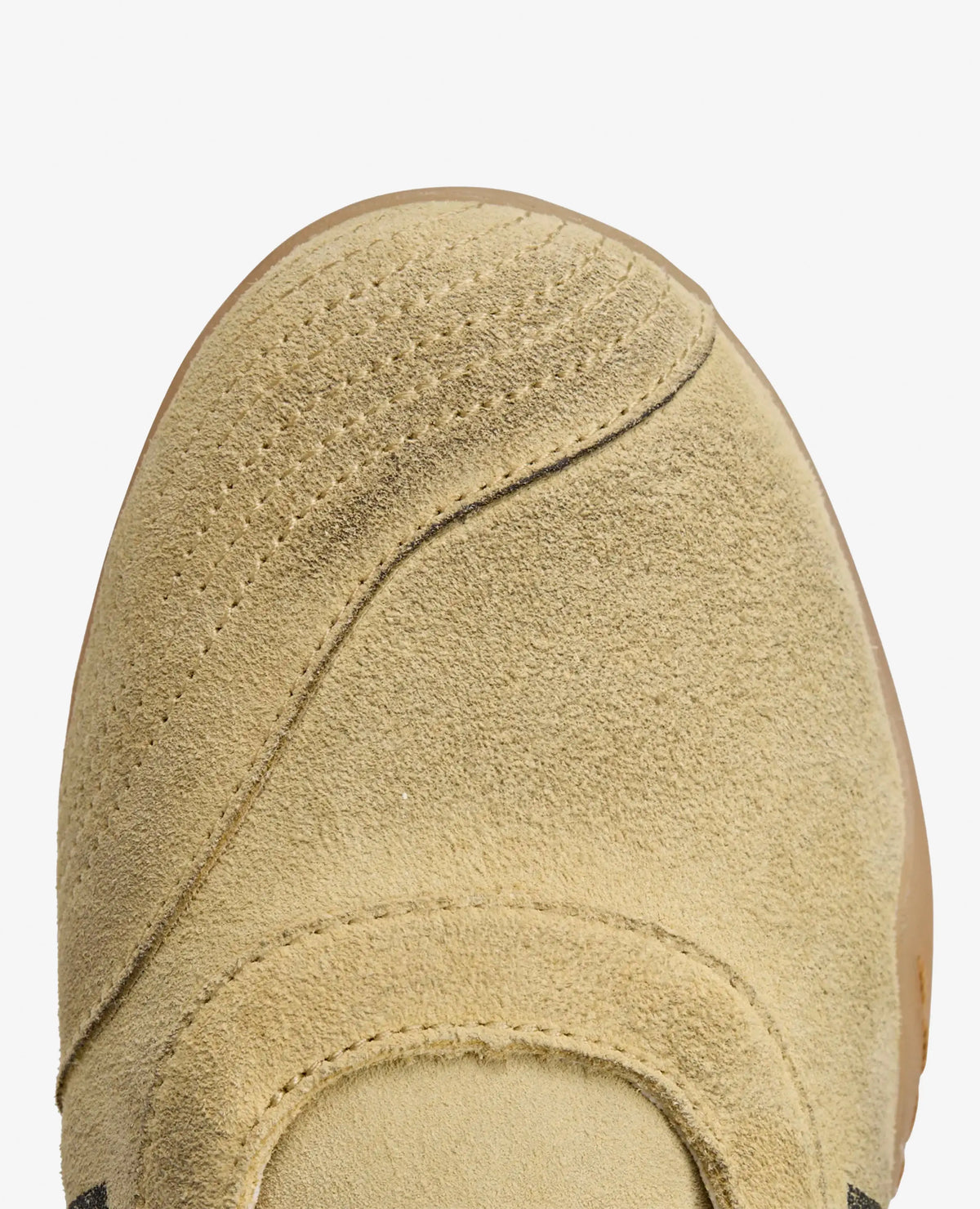 Close-up of the cream suede toe box and stitching on the adidas Song For The Mute Taekwondo Mei.
