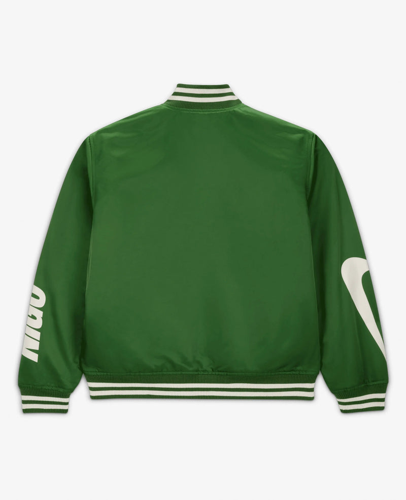 Back view of Nike x NIGO NRG coach jacket in forest green with striped ribbed trims and sleeve branding.