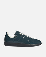 Side view of the adidas BW Army sneaker featuring a glossy dark teal patent leather upper and dark sole.