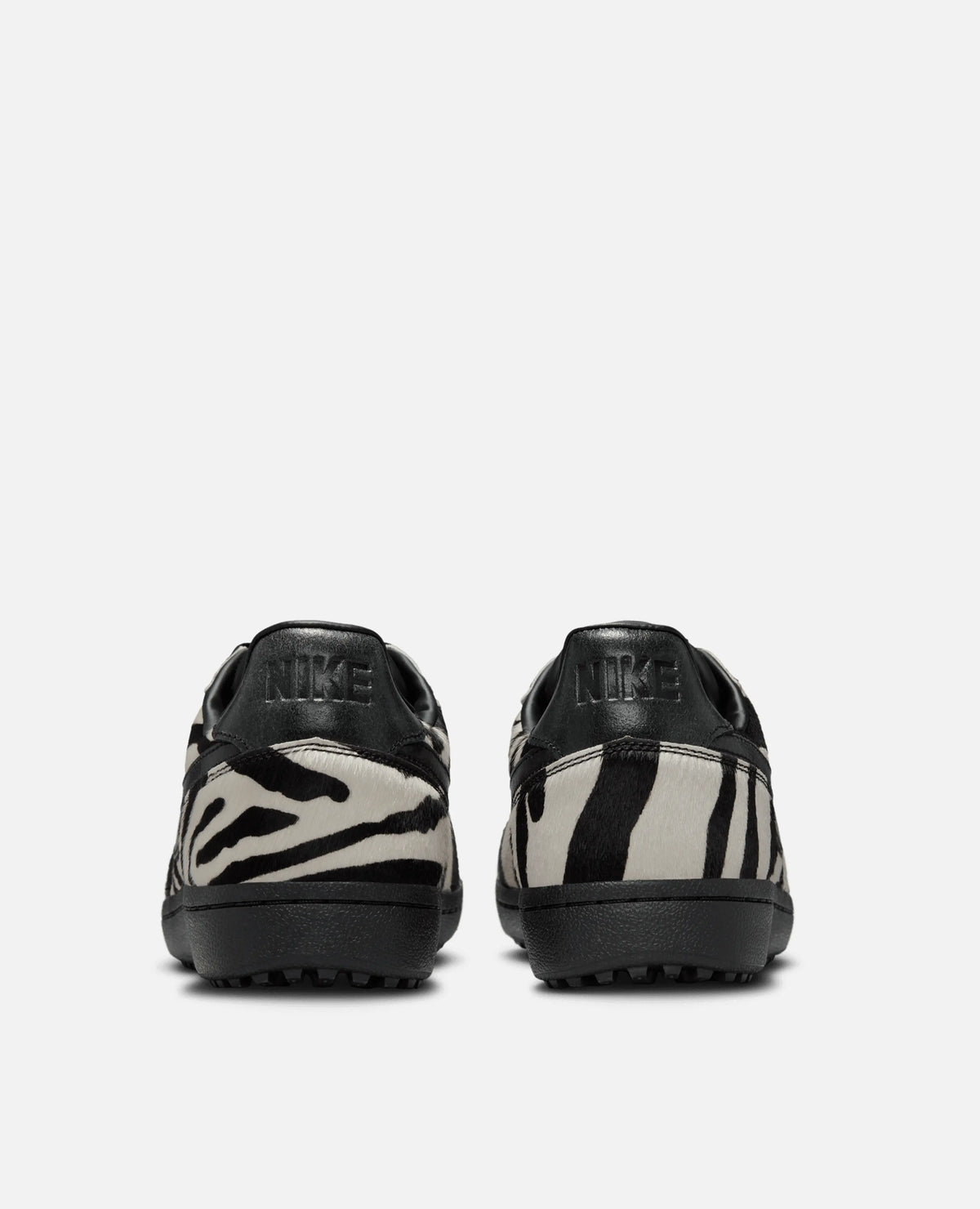 Rear view of Nike Field General Premium sneakers in zebra print faux fur with black leather heel tabs.