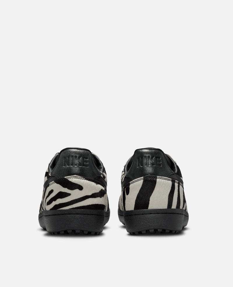 Rear view of Nike Field General Premium sneakers in zebra print faux fur with black leather heel tabs.