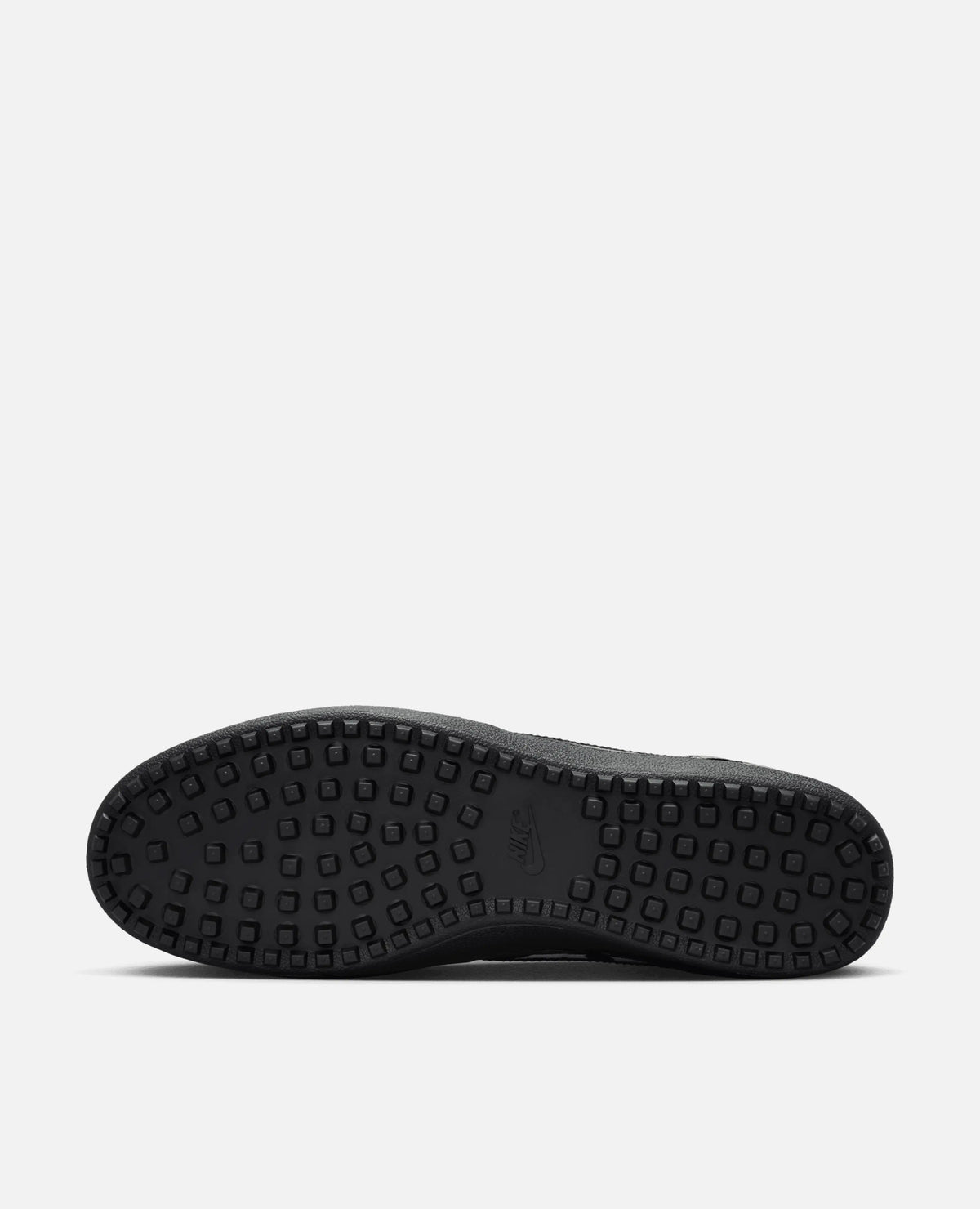 Black textured waffle outsole and tread of the Nike Field General Premium sneaker.