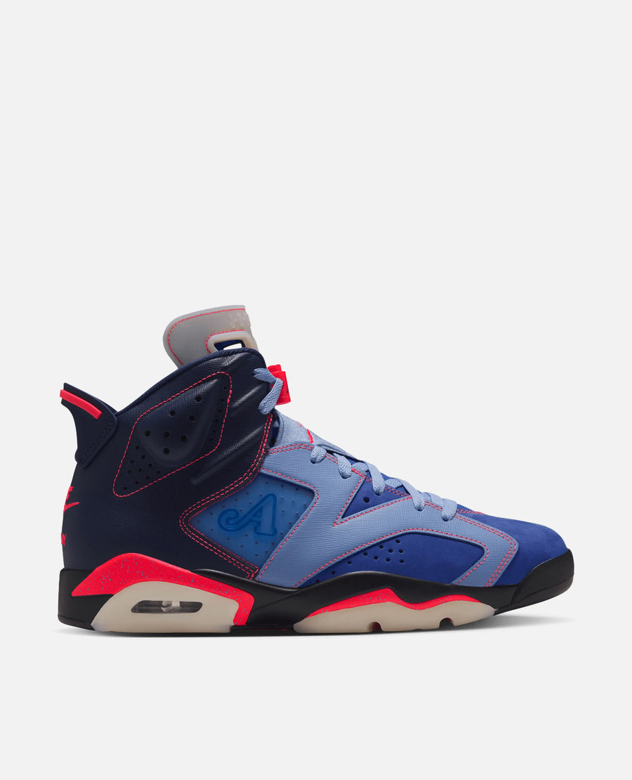 Side profile of the Air Jordan 6 Retro SP x Awake NY sneaker in midnight navy and game royal with infrared accents.