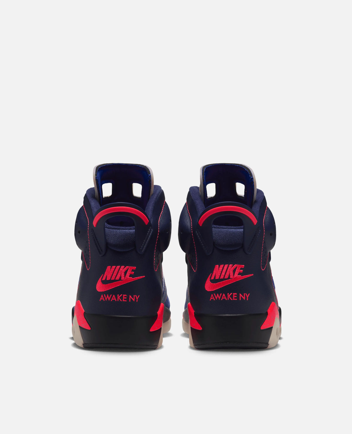 Rear view of Air Jordan 6 Retro SP x Awake NY sneakers in midnight navy with infrared Nike branding.