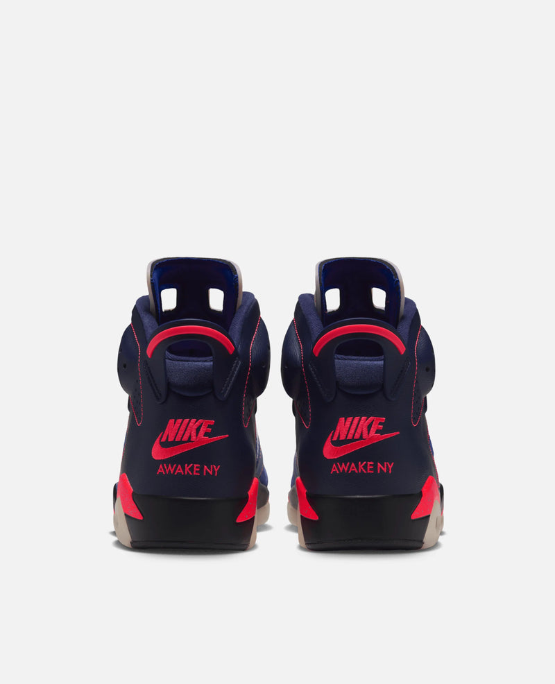 Rear view of Air Jordan 6 Retro SP x Awake NY sneakers in midnight navy with infrared Nike branding.