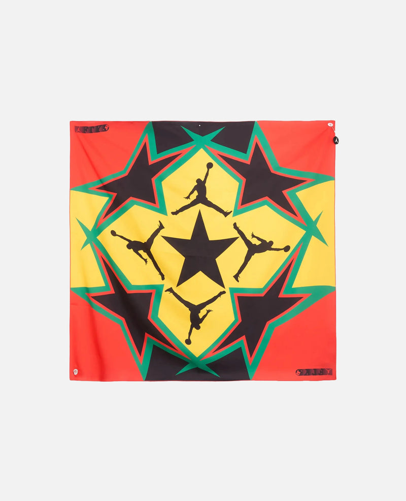 Nike Jordan x FTY scarf featuring a geometric star and Jumpman graphic in red, yellow, green, and black.