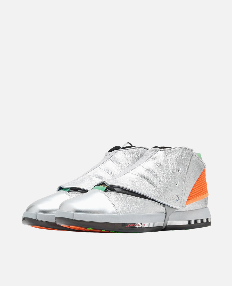 Air Jordan 16 x Free The Youth SP sneakers in metallic silver with picante red accents in a side-angled view.