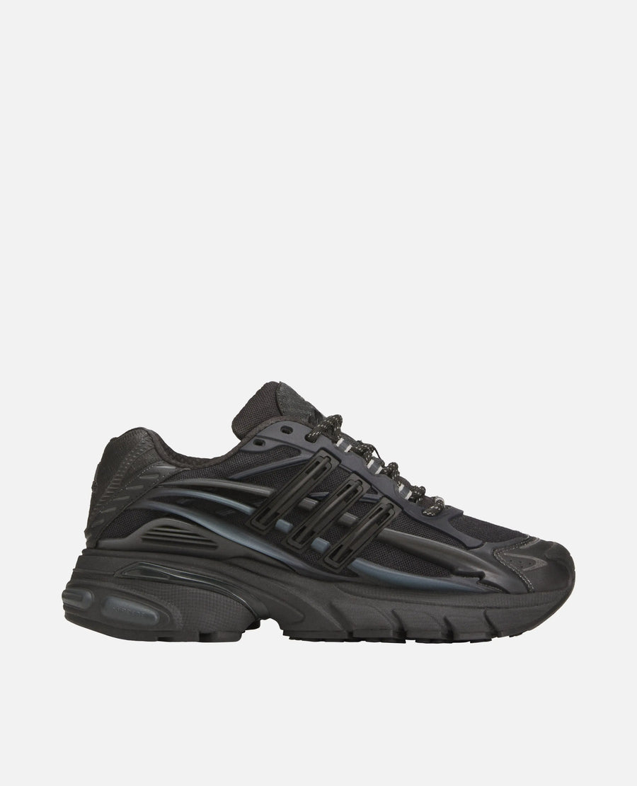 Side profile of Adidas x Pharrell Williams Adistar Jellyfish sneaker in Carbon and Core Black.