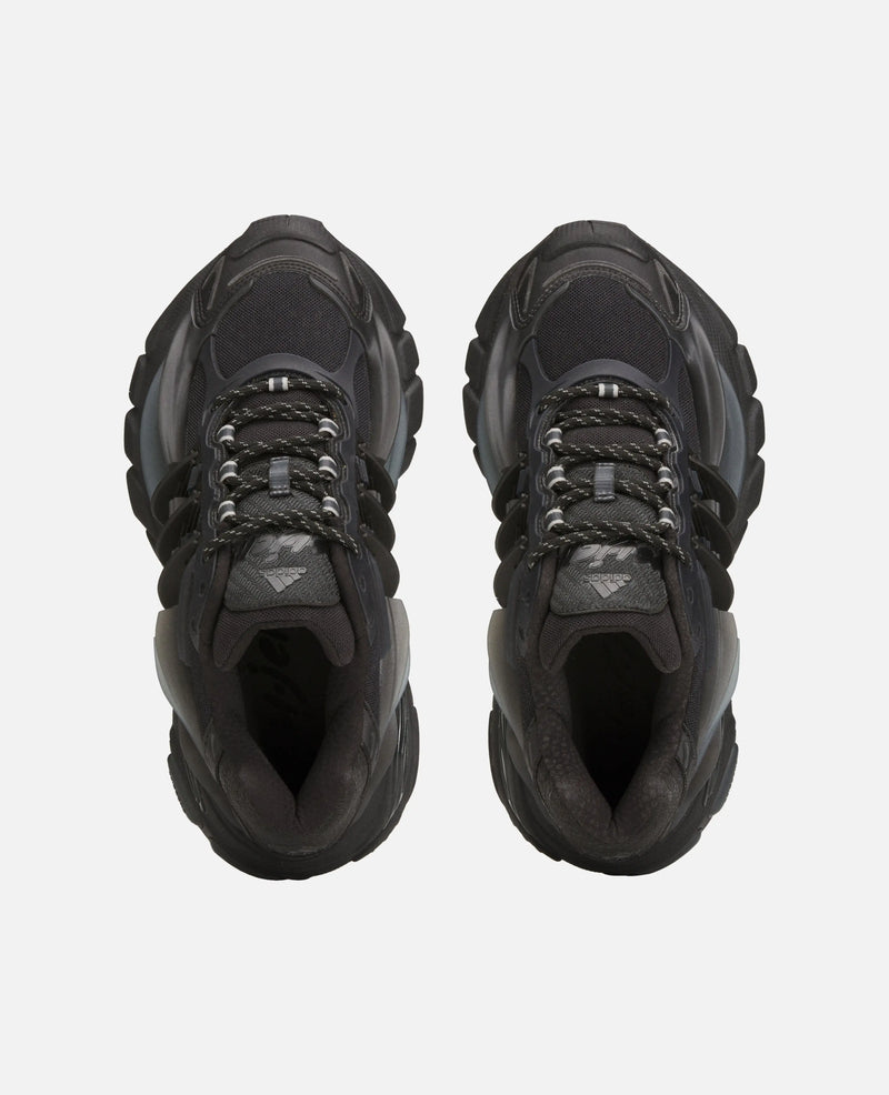 Top-down view of black Adidas x Pharrell Williams Adistar Jellyfish sneakers.