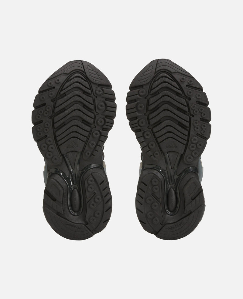 Black treaded rubber outsoles of the Adidas x Pharrell Williams Adistar Jellyfish sneakers.
