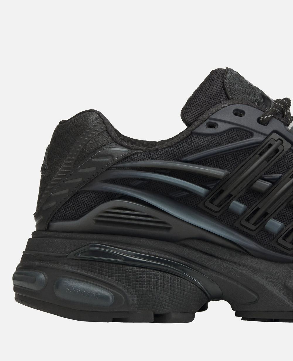 Heel and midsole detail of the Adidas x Pharrell Williams Adistar Jellyfish sneaker in Carbon Black.