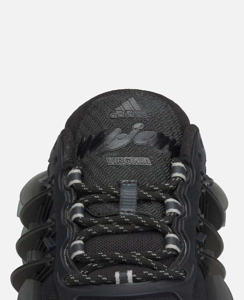 Close-up of the tongue and laces on the black Adidas x Pharrell Williams Adistar Jellyfish sneaker.
