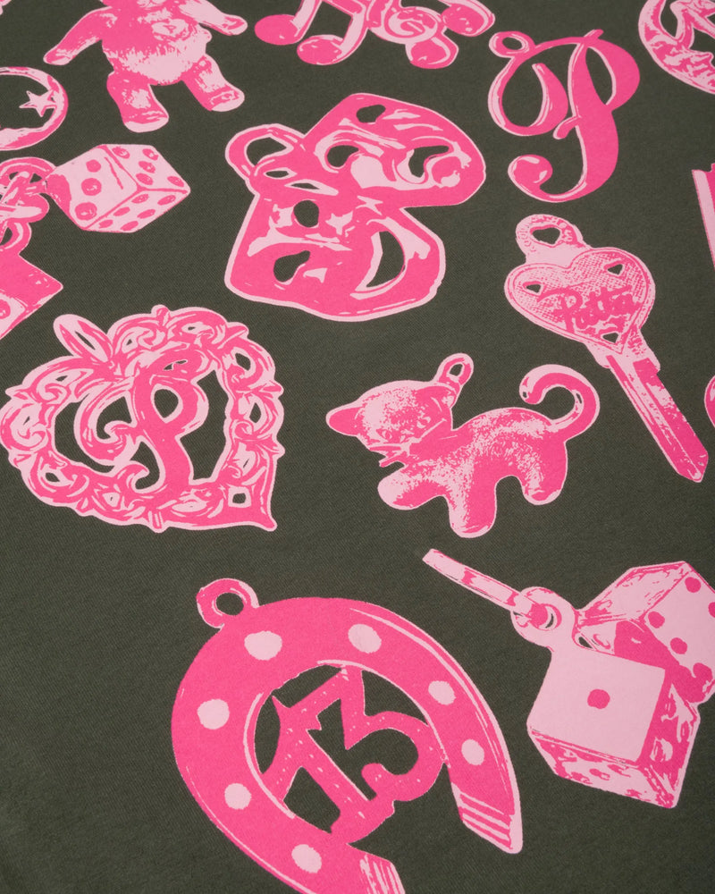 Close-up of pink charms graphic print on the Patta Charm T-Shirt in Climbing Ivy.