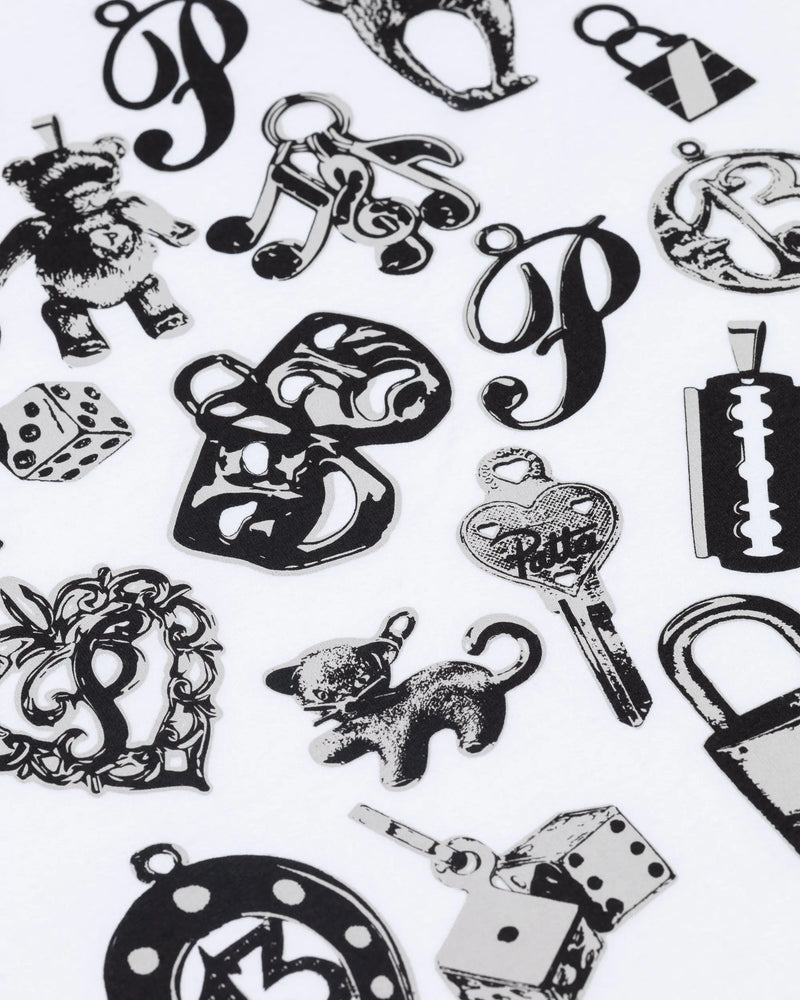 Close-up of black charms graphic print on the white Patta Kids Charm T-Shirt.