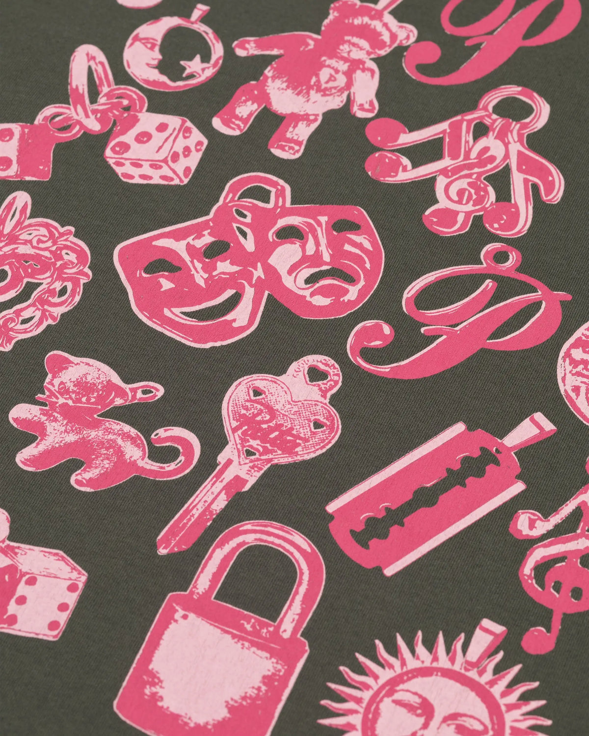 Close-up of the pink charms artwork printed on the Patta Kids Charm T-Shirt in Climbing Ivy.