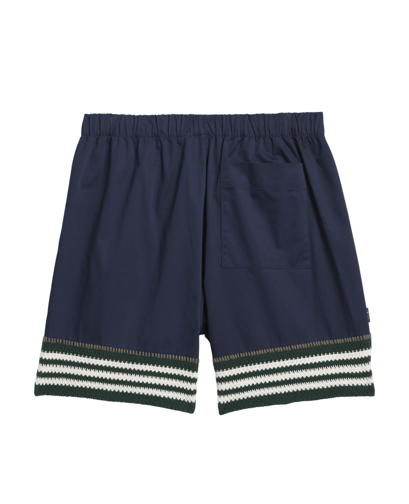 Back view of adidas Clot Crochet Shorts in Night Indigo navy with striped crochet hem trim.