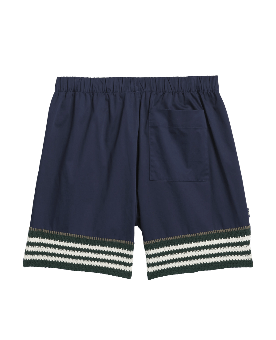 Back view of adidas Clot Crochet Shorts in Night Indigo navy with striped crochet hem trim.