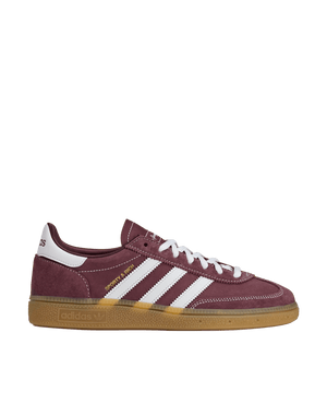adidas x Sporty & Rich Handball Spezial sneaker in shadow red suede with white three stripes and gum sole.