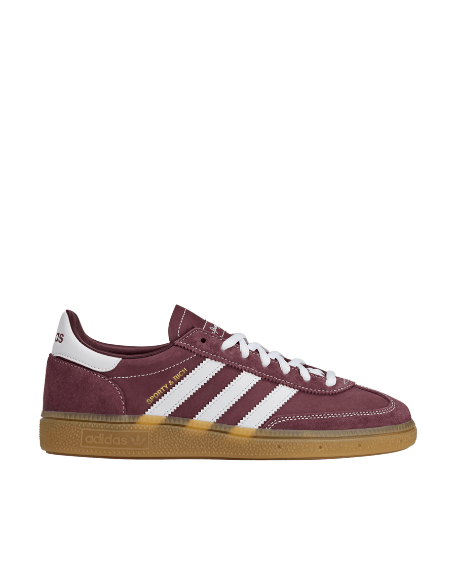 adidas x Sporty & Rich Handball Spezial sneaker in shadow red suede with white three stripes and gum sole.