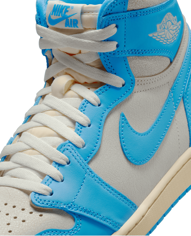 Close-up of the Air Jordan 1 Retro High 'UNC Reimagined' sneaker in powder blue and sail leather.