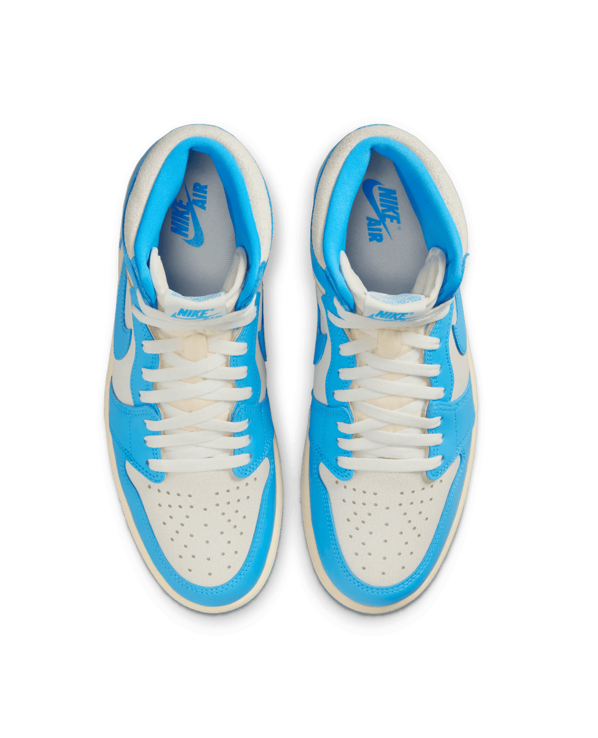 Top-down view of Air Jordan 1 Retro High UNC Reimagined sneakers in dark powder blue and sail leather.