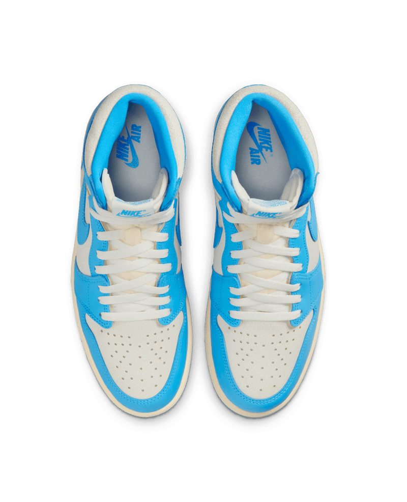 Top-down view of Air Jordan 1 Retro High UNC Reimagined sneakers in dark powder blue and sail leather.