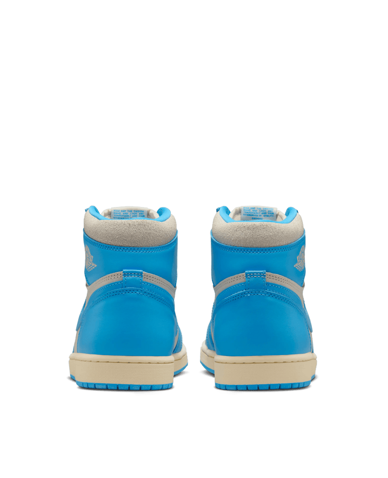 Rear view of Air Jordan 1 Retro High UNC Reimagined sneakers in powder blue and sail leather.