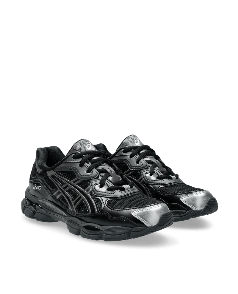 Pair of black Asics Gel-NYC sneakers with glossy overlays and silver accents on a black background.