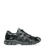 Side profile of the Asics Gel NYC sneaker in black mesh and glossy patent overlays.