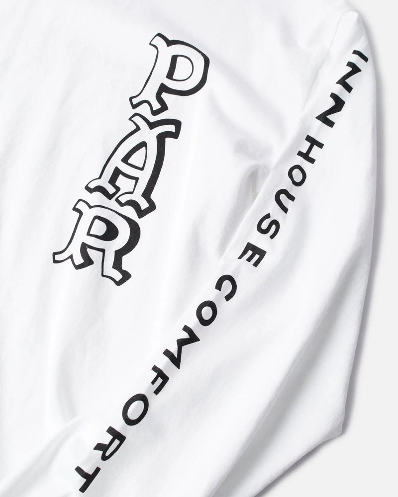 Close-up of graphic lettering on the sleeve of the white ByParra Your Face long-sleeve T-shirt.