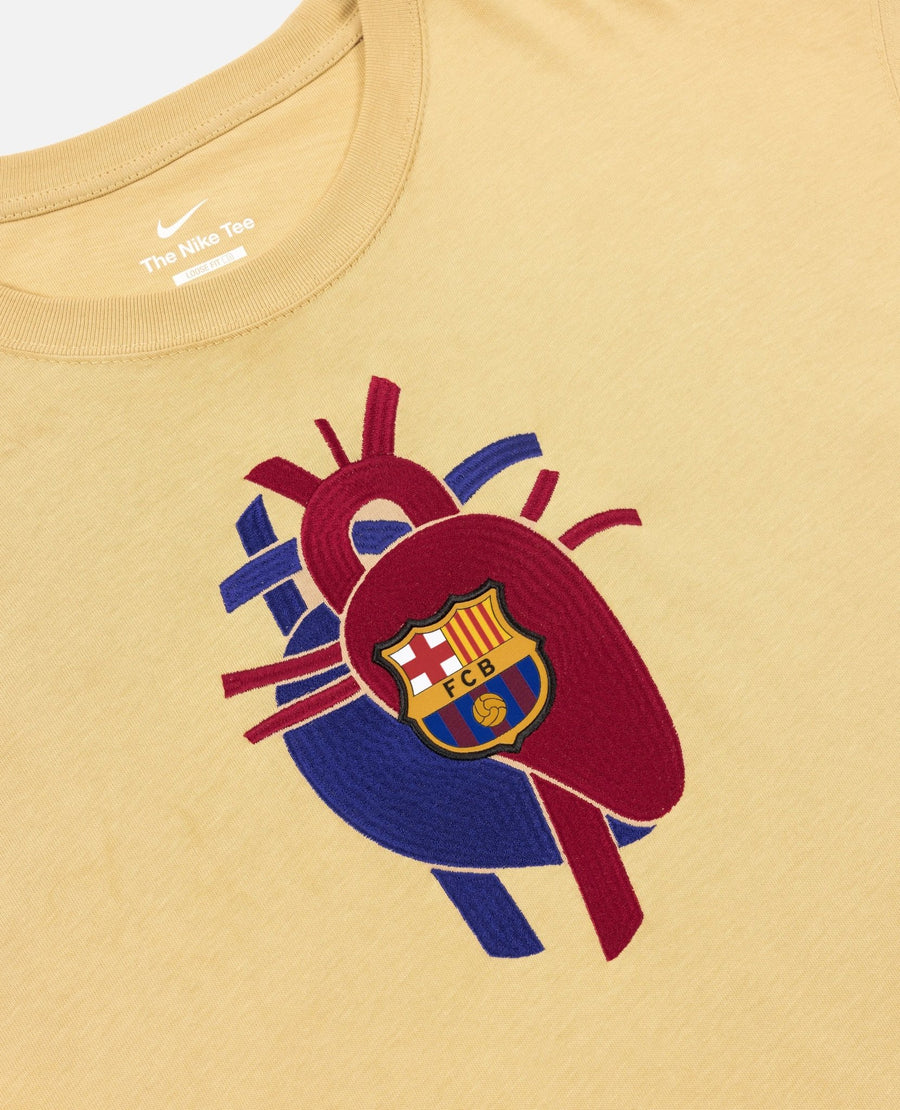 Close-up of the FC Barcelona heart graphic on the FCB x Patta Culers del Món sesame t-shirt.