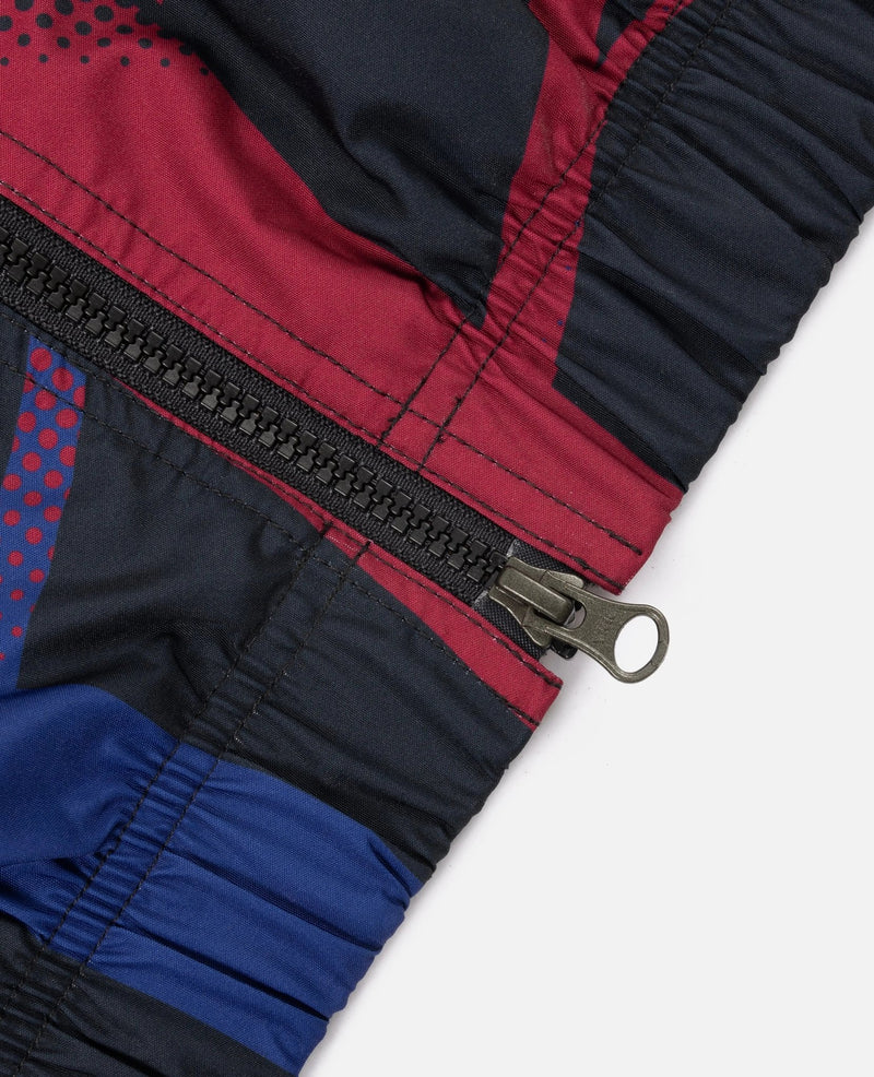 Close-up of the zipper and elastic hem on the FCB x Patta Culers del Món Track Jacket.