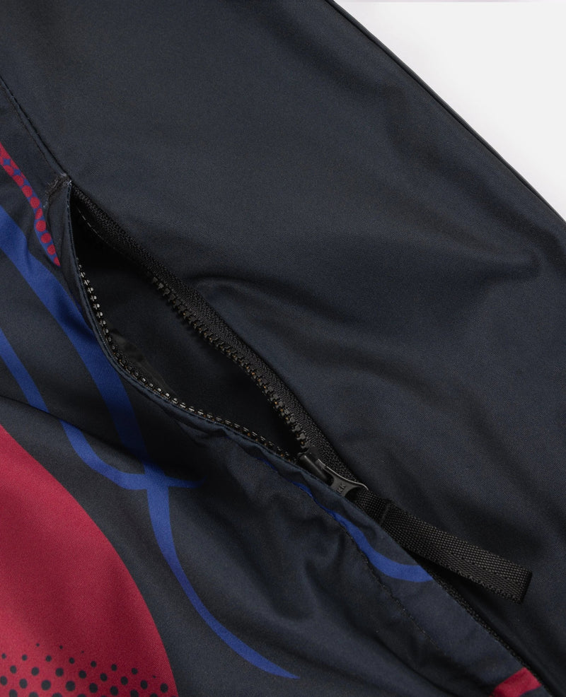 Close-up of the zippered side pocket on the FCB x Patta Culers del Món track jacket.